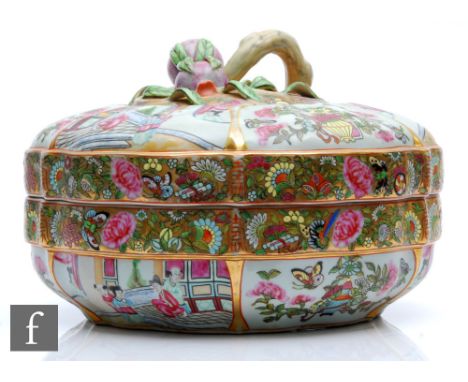 A Chinese Canton famille rose enamel enamel lidded dish, the scalloped lotus shaped dish surmounted by a domed cover, with na