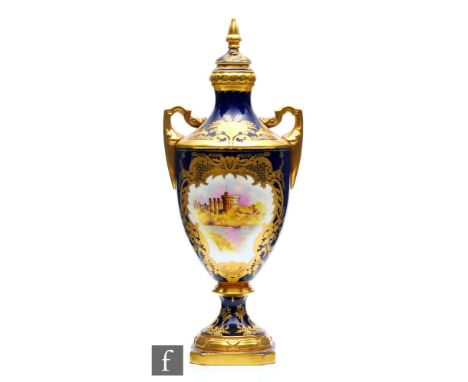 A Coalport limited edition twin handled vase commemorating the silver jubilee of Queen Elizabeth II, decorated with a hand pa