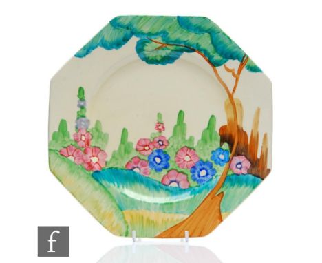 An Octagonal Clarice Cliff plate circa 1935, hand painted in the Sandon pattern with a stylised tree and garden landscape, Bi