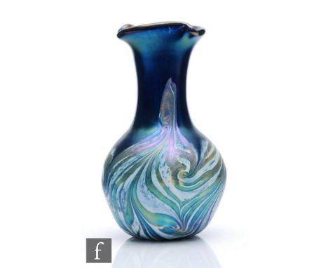 A contemporary Okra studio glass vase of globe and shaft form with triform rim, decorated with opal mottling and iridescent t