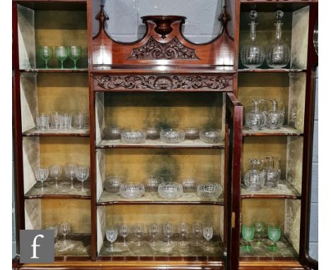 An early 20th Century Edwardian Stourbridge clear crystal glass part table suite comprising two globe and shaft decanters, fo