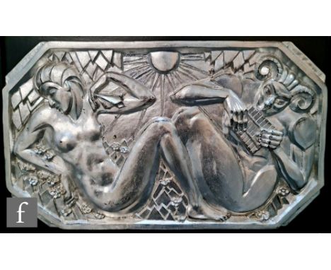 A 20th Century Art Deco Silvered Plaque after Marcel Bouraine, depicting a female nude sat opposite the character of Pan play