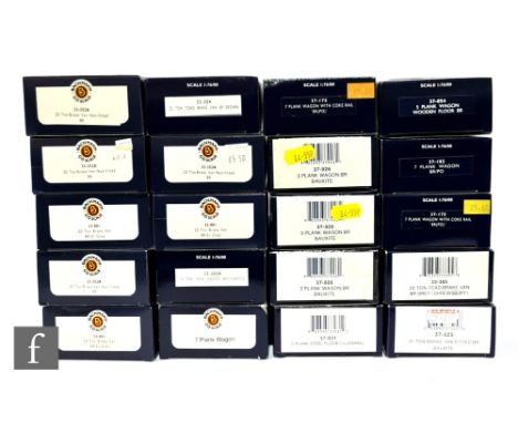 A collection of OO gauge Bachmann rolling stock, to include plank wagons and brake vans, all boxed. (20) 