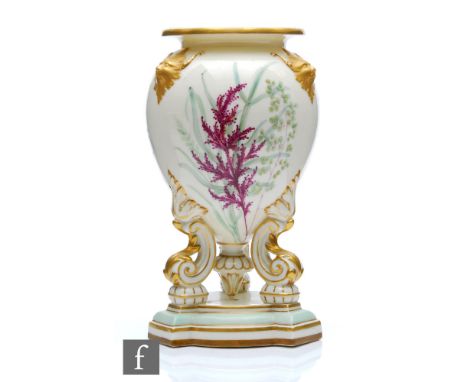 A late 19th Century vase in the style of Royal Worcester decorated to the body with hand painted ferns and grasses and gilt m