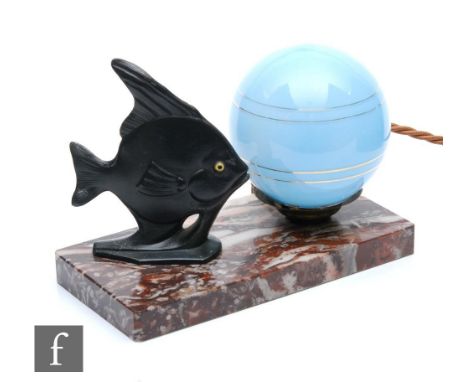A small 1930s Art Deco lamp, the rectangular marble base with a metal fish beside a blue glass ball shade, unmarked, length 2