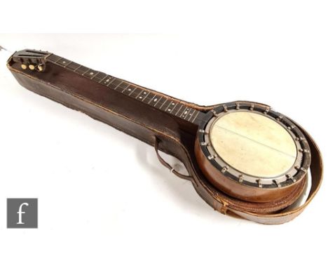 An early 20th Century six string banjo by George R Matthews in leather case, A/F. 