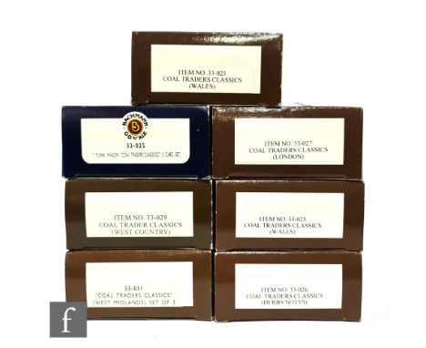 A collection of seven OO gauge Bachmann Coal Traders Classics, each containing three wagons, boxed. (7) 