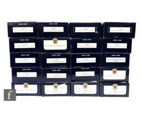 A collection of OO gauge Bachmann rolling stock, to include 25 ton Queen Mary brake vans, plank wagons, Toad brake vans etc, 