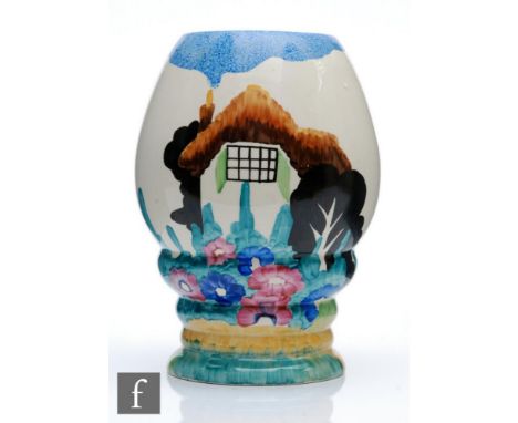 A Clarice Cliff Tralee shape 362 vase circa 1935, hand painted with a stylised thatched cottage to a garden setting, Bizarre 