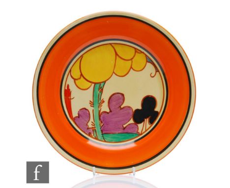 A large Clarice Cliff circular plate circa 1930, hand painted in the Summerhouse pattern with a stylised tree and garden land