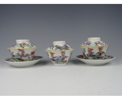 Three Chinese porcelain famille rose cups and cover/two saucers with birds-Marked-19th century. Cups=Height 7 cm. Diameter 9 