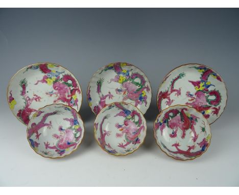 Three sets of Famille rose cups and saucers with dragon. Yongzheng 1723-1735. Cups= Height 5 cm, Diameter 9 cm. Saucer=Diamet