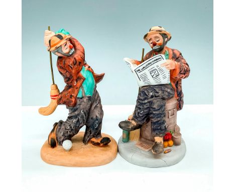 These are two collectible ceramic figurines of The Original Emmett Kelly Circus Collection. The first depicts Emmett Kelly re