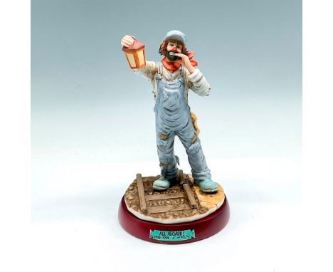 Dressed in overalls, holding lantern, calling out. Signed. No. 1044. Flambro Imports backstamp. This item has a base included