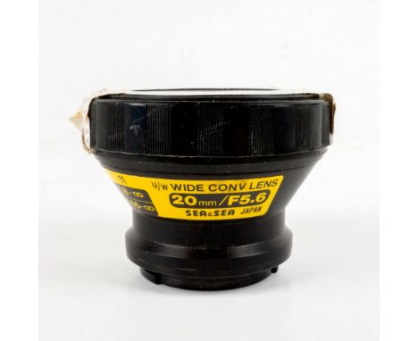 Operated by NASA; 20mm F5.6-11 underwater camera wide-angle conversion lens. Includes NASA detail label.Serial #: 881-0911 Di