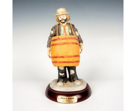 Bisque porcelain figural of the character Weary Willie standing with a barrel around him. Flambro Imports stamp. This item ha