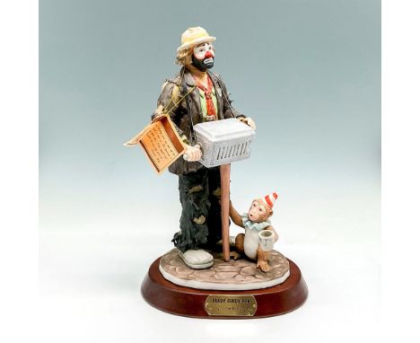 Clown figural in tattered clothes with his music box and monkey. Signed. Limited edition 2656 of 9500. Flambro backstamp. Thi