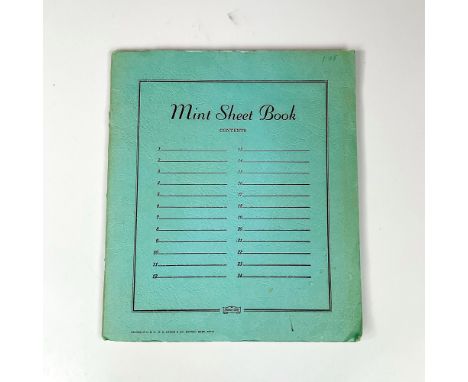 Assorted collection of vintage 1900s USPS postage stamps, contained in a mint-condition H. E. &amp; Company stamp collecting 