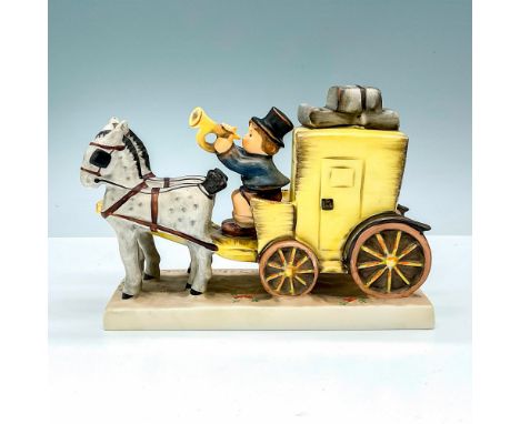 Hummel porcelain figure portraying a young boy in a traditional Bavarian costume, joyfully riding in a horse-drawn stagecoach