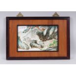 A CHINESE REPUBLICAN STYLE FRAMED PORCELAIN PANEL / TILE OF ROCKY OUTCROPS, the panel framed
