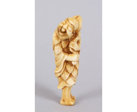 A GOOD JAPANESE LATE EDO PERIOD CARVED IVORY NETSUKE OF TOBOSAKU SENNIN, stood holding his gourd &amp; branch over his should