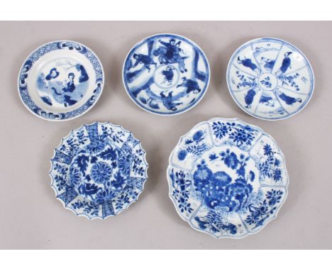 5 CHINESE KANGXI BLUE &amp; WHITE PORCELAIN SAUCERS, each decorated with varying scenes of figures in landscapes and native f