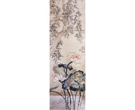 A 20TH CENTURY CHINESE HAND PAINITED ON PAPER HANGING SCROLL, depicting an impression of floral display, the central right se