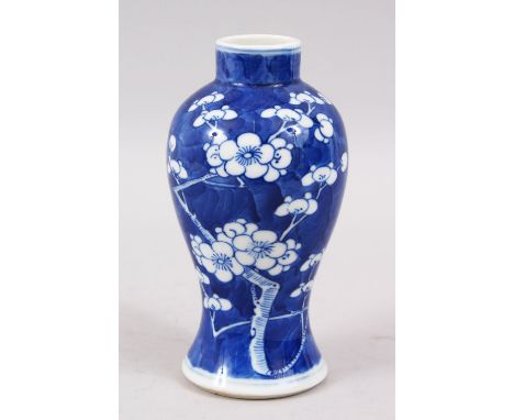 A 19TH CENTURY CHINESE BLUE &amp; WHITE PORCELAIN PRUNUS VASE, the base with a four character kangxi mark, 16.5cm high.