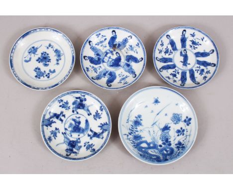 5 CHINESE KANGXI BLUE &amp; WHITE PORCELAIN SAUCERS, each decorated with varying scenes of figures in landscapes and native f