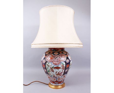 A LARGE 18TH CENTURY EDO PERIOD JAPANESE IMARI VASE / LAMP, the globular shaped vase with panels of Shi Shi dogs, phoenix bir