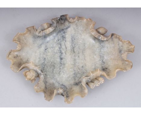 A GOOD LARGE 19TH / 20TH CENTURY CHINESE JADE BRUSH REST / DISH, carved in lotus leaf form with flowers and stems, 4.5cm high
