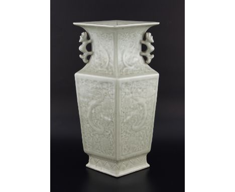20th century Chinese celadon Longquan style vase of lozenge section with moulded dragon and floral decoration, 33.5cm high, (