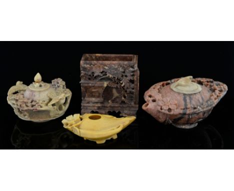 Chinese soapstone teapot and cover with pierced floral decoration, a pot and cover with bird and floral decoration, a lamp an