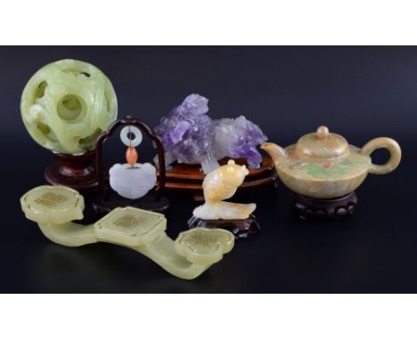 Modern Chinese green hardstone puzzleball on stand, 14cm high, rui sceptre, chopsticks, Franklin Mint pendant, amethyst lion,
