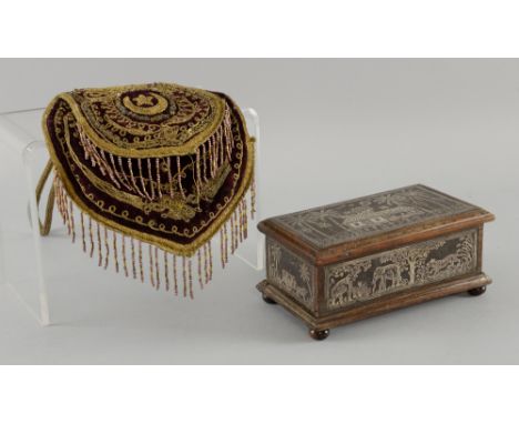 Turkish mirror bag embroidered with gold thread and an Indian rosewood and silver inlaid trinket box, 17.5cm wide,