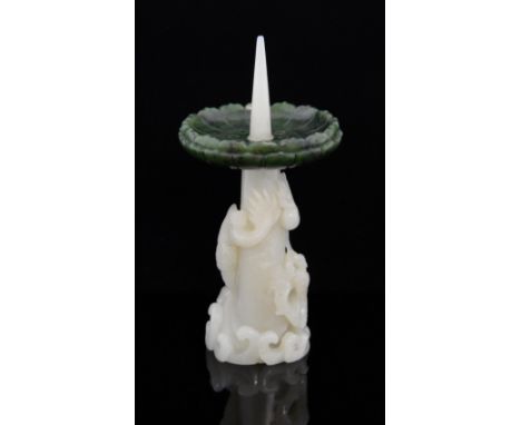 Chinese white and spinach green jade pricket candlestick, the pale even coloured jade base carved with a writhing dragon and 