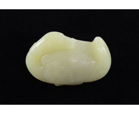 Chinese yellow jade carving of a goose with wings tucked in and head resting on it's back, 6cm long,