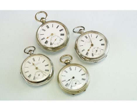 Two Early 20th century silver open faced key wind pocket watches, with black Roman numerals on white enamel dials, subsidiary