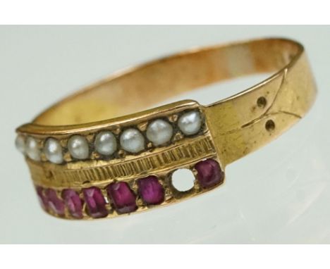 Victorian ruby and seed pearl 15ct gold ring, seven small oval mixed cut rubies to a row (one deficient) and eight small spli