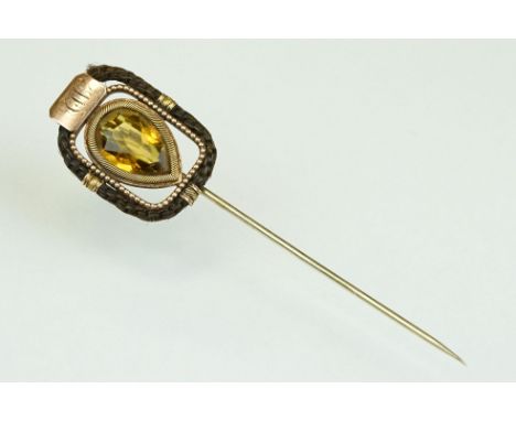 19th century citrine and hair rose metal stick pin, the pear shaped mixed cut citrine measuring approx 12.5mm x 8mm, rope twi