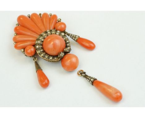 19th century coral and diamond yellow metal brooch of flared fan design, central round circular coral, diameter approx 12.5mm