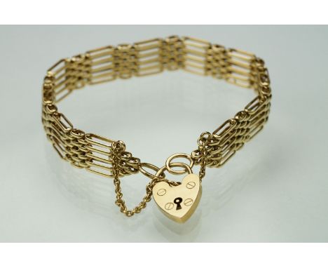 9ct yellow gold gate link bracelet with padlock clasp, width approx 10mm 