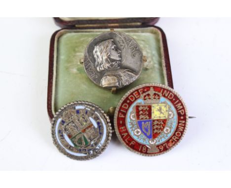 Two Victorian silver and enamel coin brooches to include an 1897 veil head crown and an 1887 jubilee head shilling, plus a Je