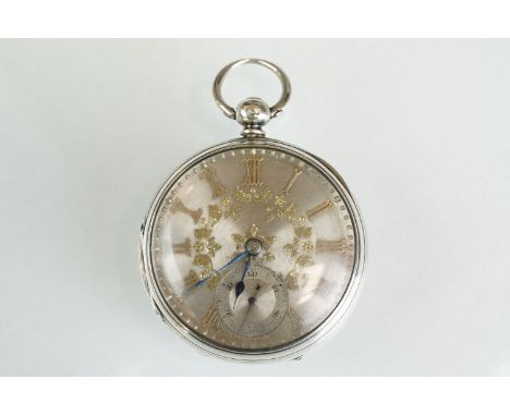 Victorian silver open faced key-wind pocket watch with yellow metal Roman numerals on an engine turned dial with applied yell