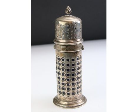 Edwardian silver sugar caster of lighthouse form, pierced body, moulded foot, reeded writhen finial, blue glass liner (af), m