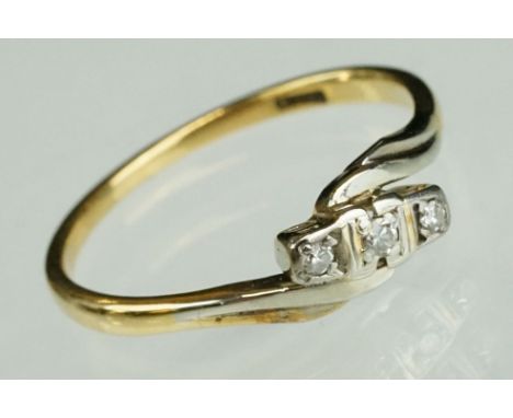 Diamond 18ct yellow gold crossover ring, three small round eight cut diamonds, illusion set, ring size R 
