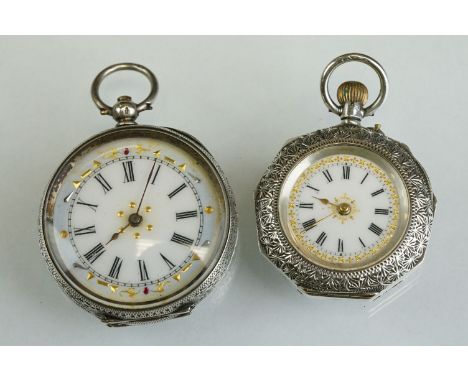 Two Continental open faced key-wind silver fob watches with applied gilt decoration on white enamel dials, black Roman numera