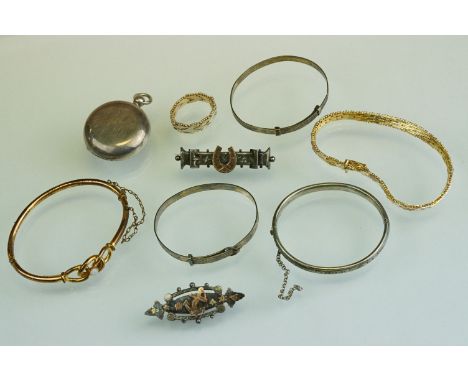 Two 19th century silver brooches, a Charles Horner silver christening bangle, hallmarked Chester 1955; a silver sovereign coi