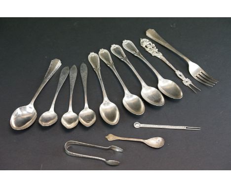 Collection of silver and white metal flatware to include a set of five white metal teaspoons with beaded &amp; floral decorat