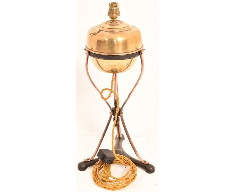 An Arts and Crafts copper and brass table lamp, converted from an oil lamp. H=48, W=15, D=15cn